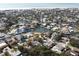 Stunning aerial view of a waterfront community featuring lush landscapes and direct Gulf access at 5353 Shadow Lawn Dr, Sarasota, FL 34242