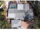 Overhead view of home with screened in pool and mature landscaping in Siesta Isles at 5353 Shadow Lawn Dr, Sarasota, FL 34242