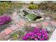Backyard water feature with water fall and rockery at 5353 Shadow Lawn Dr, Sarasota, FL 34242