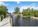 View of dock and community boat launch; a haven for boating enthusiasts at 5403 Fleming St, Port Charlotte, FL 33981