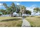 A charming park offers picnic tables under shaded gazebos, near the community's serene waterfront at 5403 Fleming St, Port Charlotte, FL 33981