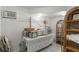 Storage area with shelving units, a table, and miscellaneous items at 5403 Fleming St, Port Charlotte, FL 33981