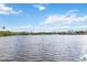 Expansive water view showcasing the tranquil waters and lush greenery of the community's surroundings at 5403 Fleming St, Port Charlotte, FL 33981