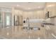 Spacious kitchen with stainless steel appliances, granite countertops, and white subway tile backsplash at 5475 Summit Gln, Bradenton, FL 34203