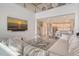Sun-filled living room and open floorplan, leading to a modern kitchen and dining area for easy living at 5475 Summit Gln, Bradenton, FL 34203