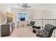 Cozy loft area with comfortable seating, a modern desk, and ample natural light at 5475 Summit Gln, Bradenton, FL 34203