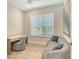 Cozy home office with desk, comfortable seating, and natural light at 5475 Summit Gln, Bradenton, FL 34203