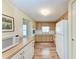 Functional kitchen with ample counter space and traditional cabinetry at 5619 Bayshore Rd # 203, Palmetto, FL 34221