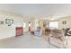 Comfortable living area with neutral tones, a dining space, and access to other rooms at 5619 Bayshore Rd # 203, Palmetto, FL 34221