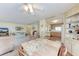The dining and living rooms are connected and provide ample seating with natural light at 5619 Bayshore Rd # 203, Palmetto, FL 34221