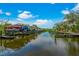Boat slips along the community waterway showcasing a beautiful day with reflections on the water at 5646 Simonton St, Bradenton, FL 34203