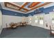 Interior of the community clubhouse, featuring tables, seating, and nautical decorations at 5646 Simonton St, Bradenton, FL 34203