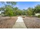 Community park featuring benches and walking path at 5646 Simonton St, Bradenton, FL 34203