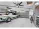 Spacious garage with a boat, bike, and ample storage space at 5646 Simonton St, Bradenton, FL 34203