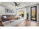Bright living room with access to patio, neutral tones, and modern decor at 5646 Simonton St, Bradenton, FL 34203