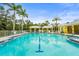 A large community pool with comfortable lounge chairs and shaded gazebos at 5646 Simonton St, Bradenton, FL 34203