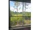 The screened patio boasts peaceful nature views and provides a relaxing outdoor living space at 5711 Bentgrass Dr # 19-203, Sarasota, FL 34235
