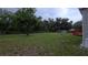 Lush backyard providing plenty of space for activities and entertainment at 6238 Angus Valley Dr, Wesley Chapel, FL 33544