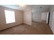 Bedroom with neutral colored walls, carpeted floor and natural light at 6238 Angus Valley Dr, Wesley Chapel, FL 33544