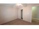 This cozy bedroom features neutral walls, a ceiling fan, and a closet for ample storage at 6238 Angus Valley Dr, Wesley Chapel, FL 33544