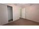 A light-filled bedroom features neutral walls, a closet, and access to a bathroom at 6238 Angus Valley Dr, Wesley Chapel, FL 33544