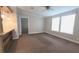 Comfortable living room with neutral carpet, ceiling fan and natural light at 6238 Angus Valley Dr, Wesley Chapel, FL 33544
