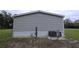 This home features a side exterior, air conditioner, and landscaping at 6238 Angus Valley Dr, Wesley Chapel, FL 33544