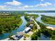 Beautiful waterfront home with stunning aerial views of the surrounding waterways and lush landscapes at 6406 Lincoln Rd, Bradenton, FL 34203