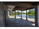 Back patio area with pillars overlooking the waterfront at 6406 Lincoln Rd, Bradenton, FL 34203