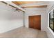 Bedroom featuring vaulted ceilings, tile flooring and large closet at 6406 Lincoln Rd, Bradenton, FL 34203