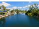 Scenic waterway surrounded by lush greenery and charming homes at 6406 Lincoln Rd, Bradenton, FL 34203