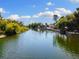 Picturesque waterway with lush greenery and waterfront properties at 6406 Lincoln Rd, Bradenton, FL 34203