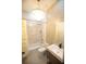 Stylish bathroom features a modern vanity, tub-shower combo, and a stunning chandelier at 6713 Taneytown St, North Port, FL 34291