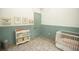 A beautiful Bedroom featuring a crib, changing table, and lovely decor at 6713 Taneytown St, North Port, FL 34291