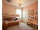 Charming bedroom with bunk beds, study desk, and bright decor, perfect for  at 6713 Taneytown St, North Port, FL 34291