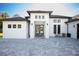 Stunning entrance featuring a decorative front door and a paved driveway at 6713 Taneytown St, North Port, FL 34291