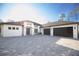 Stunning modern home with a spacious driveway and two-car garage, offering curb appeal and convenience at 6713 Taneytown St, North Port, FL 34291