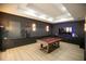 Spacious game room with a pool table, recessed lighting, and a mounted TV at 6713 Taneytown St, North Port, FL 34291