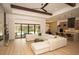 Spacious living room with a large sectional sofa and a view of the pool at 6713 Taneytown St, North Port, FL 34291