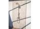 Modern outdoor shower with stone backdrop, providing a refreshing outdoor bathing experience at 6713 Taneytown St, North Port, FL 34291