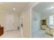Welcoming entryway and an adjacent office space with stylish furniture and decor at 6756 Chester Trl, Lakewood Ranch, FL 34202