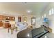 Bright open-concept living room with tile floors, neutral walls, and modern furnishings at 6756 Chester Trl, Lakewood Ranch, FL 34202