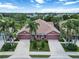 Aerial view of home featuring lush landscaping, double car garages and well-maintained exteriors at 7314 Hamilton Rd, Bradenton, FL 34209