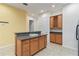 Stylish kitchen island features wood cabinets and modern countertop at 7314 Hamilton Rd, Bradenton, FL 34209