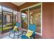 Cozy screened lanai with views of the yard, perfect for relaxing or entertaining guests at 7314 Hamilton Rd, Bradenton, FL 34209