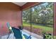 The screened lanai offers beautiful views of the green outdoor space at 7314 Hamilton Rd, Bradenton, FL 34209