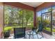 Enjoy a relaxing screened lanai with peaceful views of the surrounding landscaping at 7314 Hamilton Rd, Bradenton, FL 34209