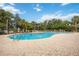 Enjoy the community pool with plenty of space for lounge chairs and tables at 7314 Hamilton Rd, Bradenton, FL 34209