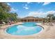 Community pool with lounge seating, perfect for relaxing and enjoying the Florida sunshine at 7314 Hamilton Rd, Bradenton, FL 34209