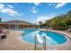 Community pool with lounge seating, perfect for relaxing and enjoying the Florida sunshine at 7314 Hamilton Rd, Bradenton, FL 34209
